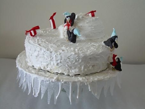 Snow cake and the five present wrapping penguins Snow cake and the five present wrapping penguins