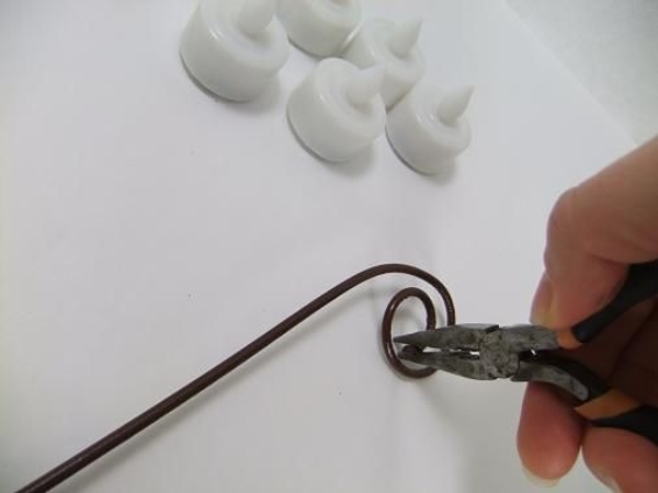 Spiral curl the wire. Spiral curl the wire.