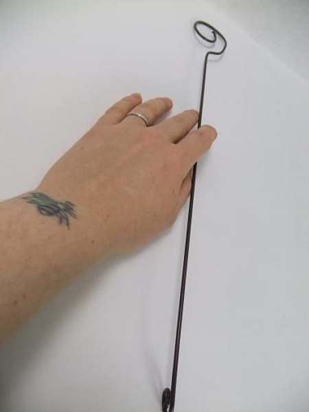 This wire will hang in the middle of the chandelier This wire will hang in the middle of the chandelier