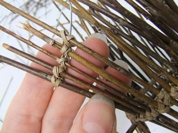 Tie the twigs to the top wire ring Tie the twigs to the top wire ring