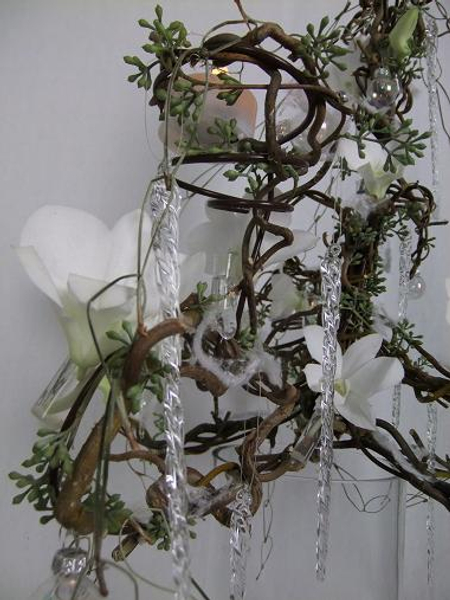 Twisted hazel branches and willow stems, eucalyptus and Dendrobium orchids
