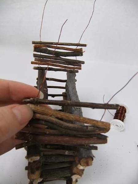 Add twigs until the sides meet in the middle Add twigs until the sides meet in the middle