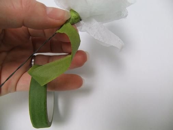 Cover the wire with green florist tape Cover the wire with green florist tape
