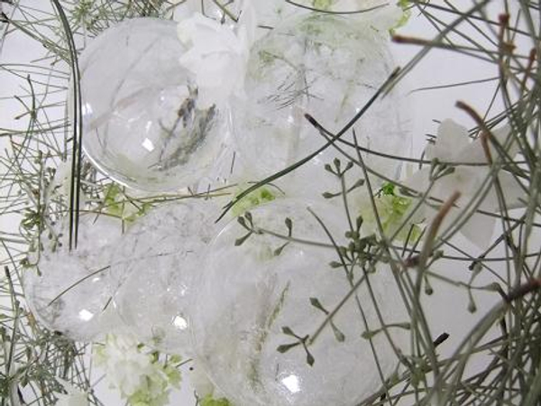 Frosted glass baubles, eucalyptus, shooting star hydrangea and pine needles