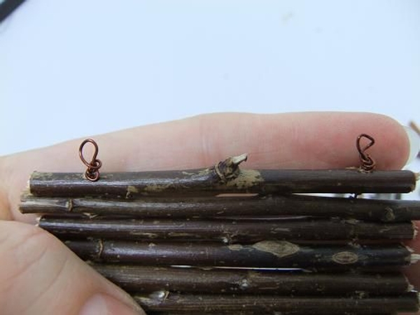 Wrap the rest of the wire around the loop Wrap the rest of the wire around the loop