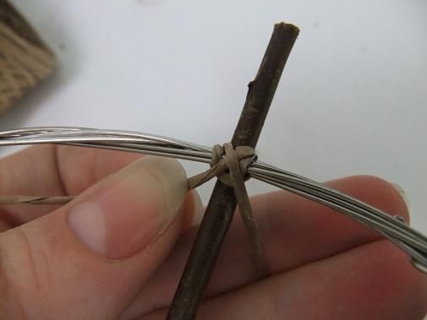 Cross the wire at the back Cross the wire at the back