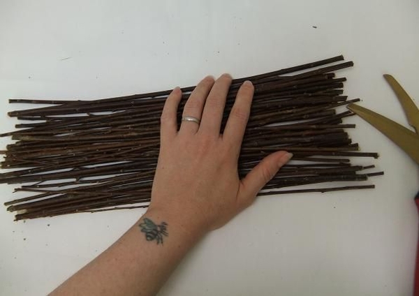 Cut some twigs to bind to the wire circles Cut some twigs to bind to the wire circles