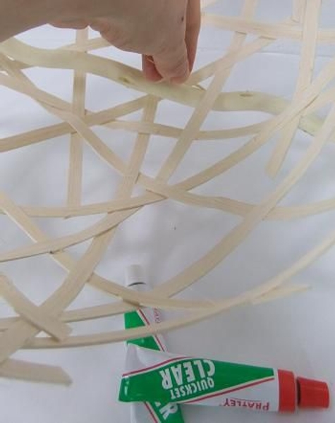 Glue the legs in place with an epoxy glue Glue the legs in place with an epoxy glue