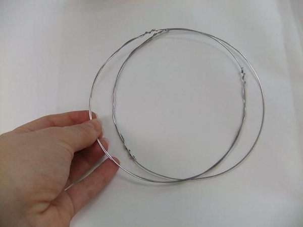 Make two small wire circles Make two small wire circles