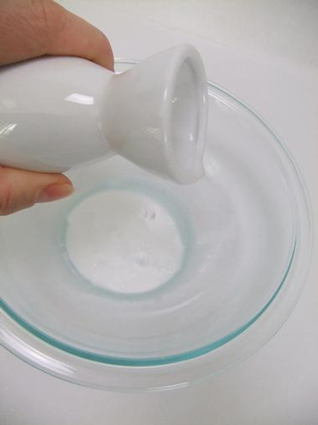 Pour wood glue into a bowl and thin with warm water