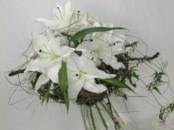 Create a foliage mesh for the flowers to open through. Create a foliage mesh for the flowers to open through.