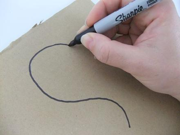 Draw the heart shape on cardboard