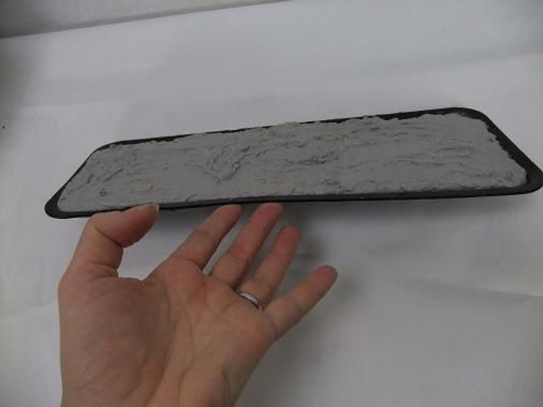 Lift the cement tray Lift the cement tray