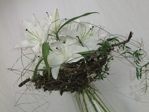 Nestle the lilies and jasmine tendrils in a spring twig nest.jpg