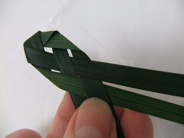 Fold the next blade up over the front and the other side around the back Fold the next blade up over the front and the other side around the back