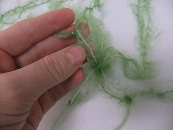 Move around the tassel and knot each pair of strands Move around the tassel and knot each pair of strands