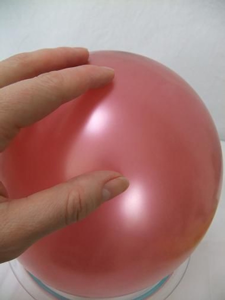 Rest the balloon on a container Rest the balloon on a container