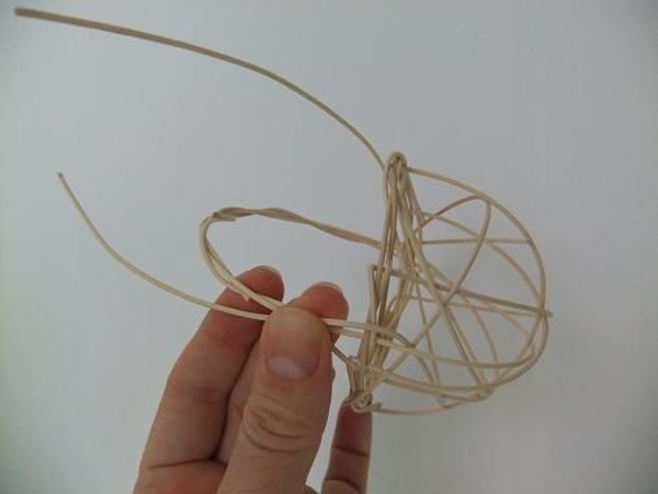 Add another rattan piece from the other side to create a neat handle Add another rattan piece from the other side to create a neat handle