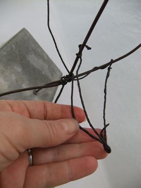 Make a small wire tip and secure it to extend from the bottom Make a small wire tip and secure it to extend from the bottom