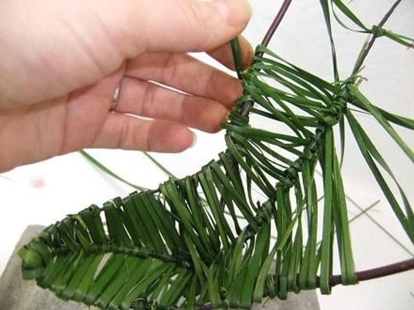 Move on to the tip and weave it all the way up. Move on to the tip and weave it all the way up.