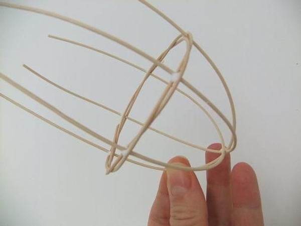 Secure the rattan pieces with a few drops of wood glue Secure the rattan pieces with a few drops of wood glue