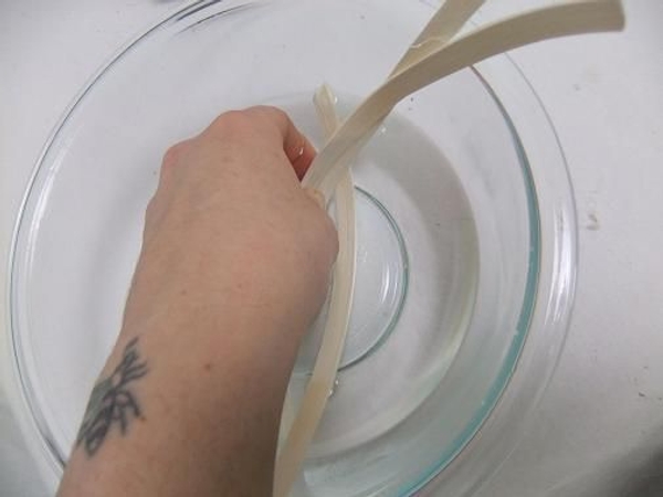 Soak the cane strips in warm water Soak the cane strips in warm water