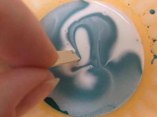 Mix water based paint into wood glue. Mix water based paint into wood glue.