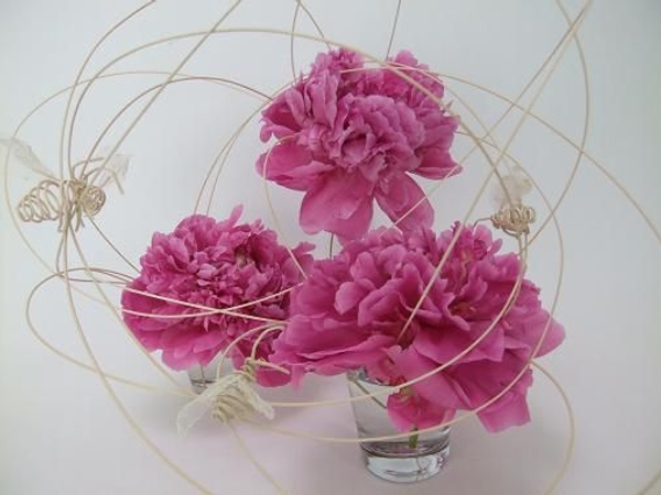 Rattan and peony flower arrangement.