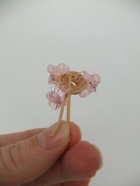 Secure the rattan spirals with butterfly hair clips Secure the rattan spirals with butterfly hair clips