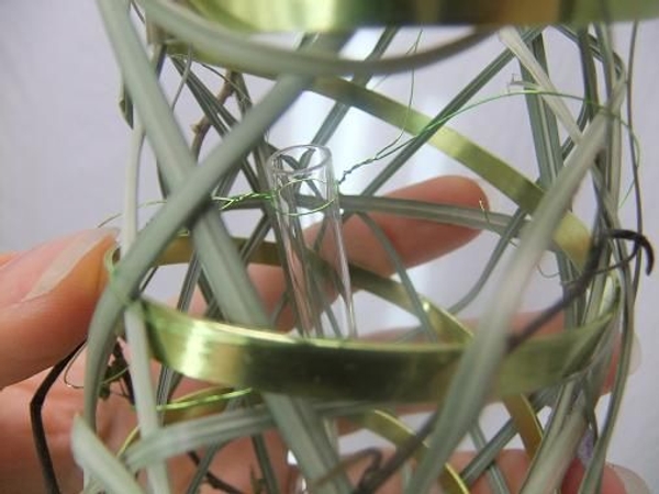 Wire in a few glass test tubes for the fresh flower material Wire in a few glass test tubes for the fresh flower material