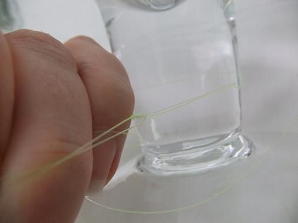 Catch the wire through the knot Catch the wire through the knot