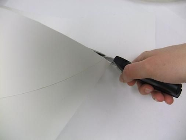 Cut the top part of the cone so that it can stand flat Cut the top part of the cone so that it can stand flat