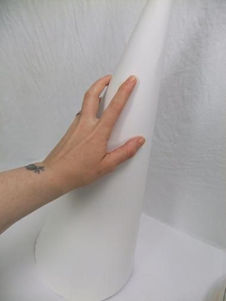 Place the cone on a large working surface Place the cone on a large working surface