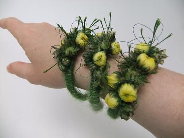 Robust chrysanthemum bracelets that can be worn alone or stacked for impact Robust chrysanthemum bracelets that can be worn alone or stacked for impact