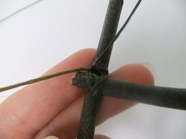 Tie off the grass to secure Tie off the grass to secure