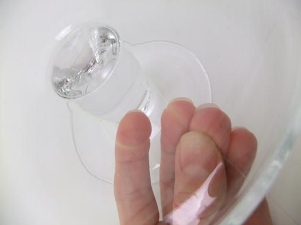 Wrap the line around the stem of the glass container Wrap the line around the stem of the glass container