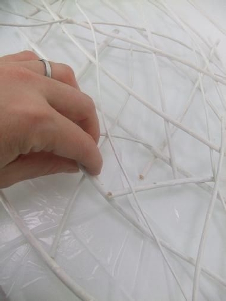 Add a few short twigs to strengthen any weak spots Add a few short twigs to strengthen any weak spots