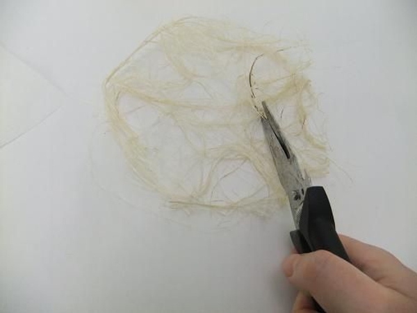 Cut away the middle of the smaller circle to create the small brim Cut away the middle of the smaller circle to create the small brim