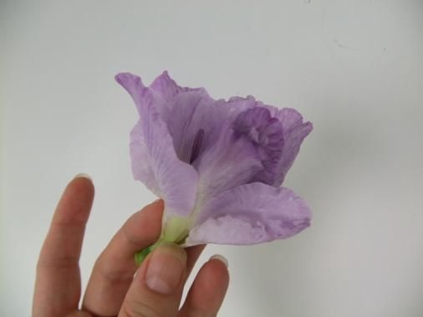 Split another flower open and wrap that around the bud Split another flower open and wrap that around the bud