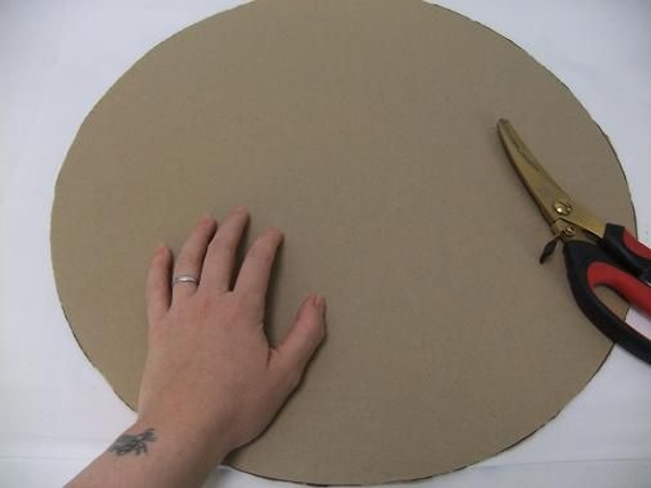 Cut a large cardboard circle Cut a large cardboard circle