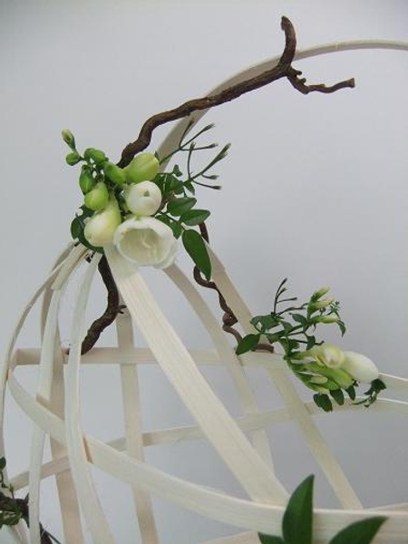 Freesia, jasmine and hazel decorate the basket Freesia, jasmine and hazel decorate the basket