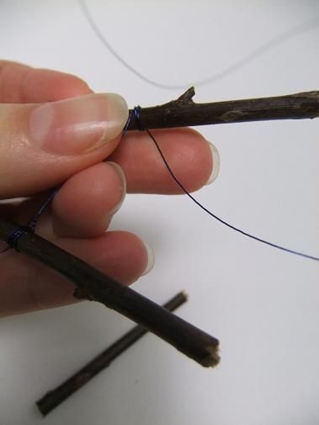 Move down the wire and wrap and twist another twig Move down the wire and wrap and twist another twig