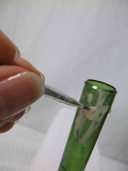 Paint the test tube with a layer of wood glue