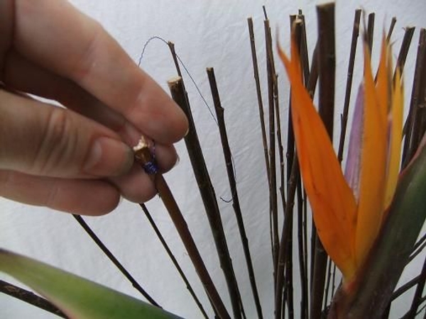Spear in a few more twigs to complete the shape Spear in a few more twigs to complete the shape