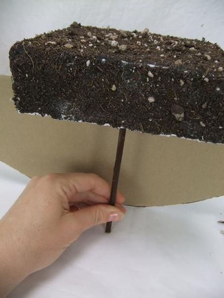 Spear the first twig into the Styrofoam block. Spear the first twig into the Styrofoam block.
