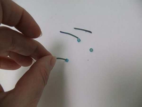 Thread the thinest pend of the stem through the bead Thread the thinest pend of the stem through the bead