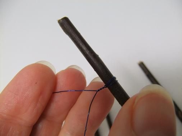 Twist the wire a few times to secure Twist the wire a few times to secure