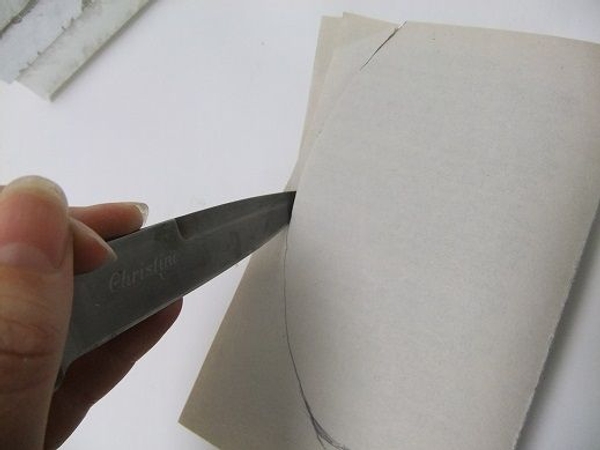 Cut out the shape with a very sharp knife Cut out the shape with a very sharp knife