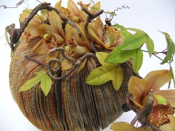 Hazel twig on a paper pumpkin