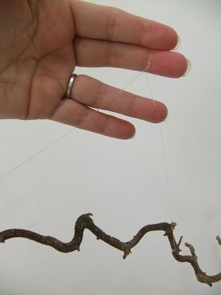 Knot the line at the balance point to make it easier to hang Knot the line at the balance point to make it easier to hang
